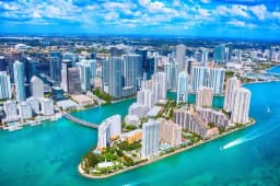 Will the lowest temperature in Miami be 73°F or below on May 18?