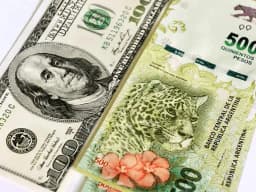 Will the official USD to ARS exchange rate be less than 1420.00 at the end of January 2026?