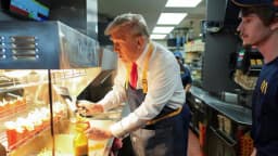 Will Trump say "Communist" or "Radical" 2+ times during the McDonald's Summit on November 17?