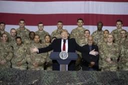 Will Trump say "AI" or "Artificial Intelligence" during Japan troop visit on October 28?
